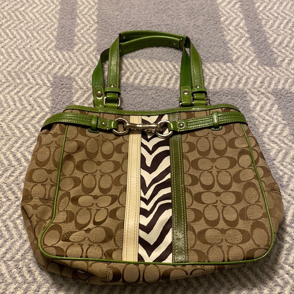 Coach purse green trim with black and white animal print down center. EUC